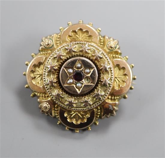 A Victorian yellow metal, gem and seed pearl set brooch, with glazed back, 30mm.